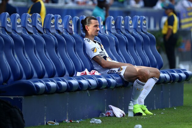 CARSON, CA - OCTOBER 28:  Zlatan Ibrahimovic #9 of Los Angeles Galaxy sits alone on the bench after their 3-2 loss to the Houston Dynamo in their MLS match at StubHub Center on October 28, 2018 in Carson, California. The Galaxy loss leaves them out of this year's playoffs.  (Photo by Victor Decolongon/Getty Images)