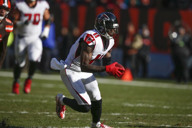 Atlanta Falcons wide receiver Julio Jones (11) runs after a pass reception against the Cleveland Browns in the first half of an NFL football game, Sunday, Nov. 11, 2018, in Cleveland. (AP Photo/Ron Schwane)