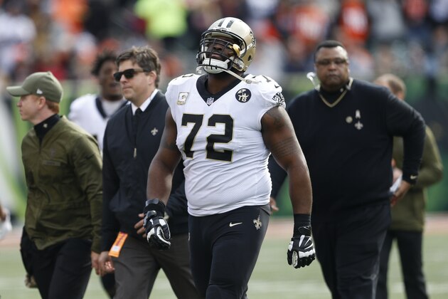 New Orleans Saints offensive tackle Terron Armstead (72) is helped off the field in the first half of an NFL football game against the Cincinnati Bengals, Sunday, Nov. 11, 2018, in Cincinnati. (AP Photo/Gary Landers)