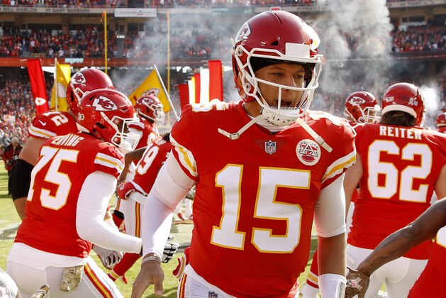 Kansas City Chiefs quarterback Patrick Mahomes (15) runs onto the field before an NFL football game against the Arizona Cardinals Sunday, Nov. 11, 2018, in Kansas City, Mo. The Chiefs won 26-14. (AP Photo/Charlie Riedel)