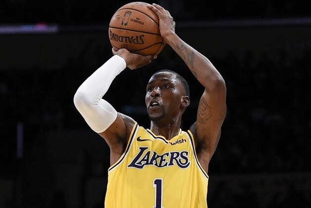 Los Angeles Lakers guard Kentavious Caldwell-Pope attempts a shot during the first half of an NBA preseason basketball game against the Sacramento Kings in Los Angeles, Thursday, Oct. 4, 2018. (AP Photo/Kelvin Kuo)