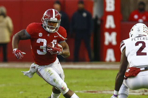 Alabama running back Damien Harris (34) carries the ball during the second half of an NCAA college football game against Mississippi State, Saturday, Nov. 10, 2018, in Tuscaloosa, Ala. (AP Photo/Butch Dill)