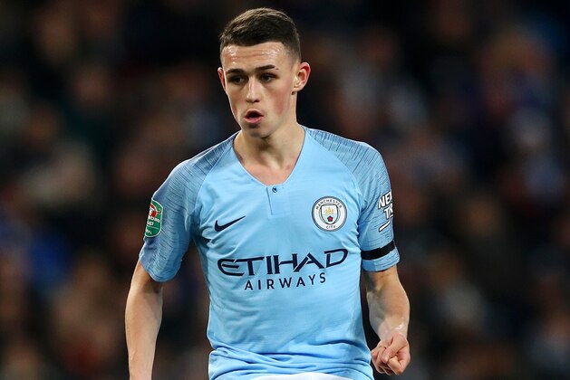 MANCHESTER, ENGLAND - NOVEMBER 01:  Phil Foden of Manchester City passes the ball during the Carabao Cup Fourth Round match between Manchester City and Fulham at Etihad Stadium on November 1, 2018 in Manchester, England.  (Photo by Matthew Lewis/Getty Images)