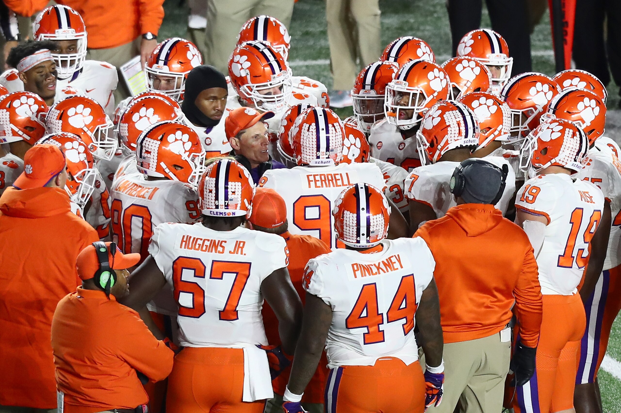 CHESTNUT HILL, MA - NOVEMBER 10:  Head coach Dabo Swinney of the Clemson Tigers talks to the team in the huddle during the second quarter of the game against the Boston College Eagles at Alumni Stadium on November 10, 2018 in Chestnut Hill, Massachusetts.  (Photo by Omar Rawlings/Getty Images)