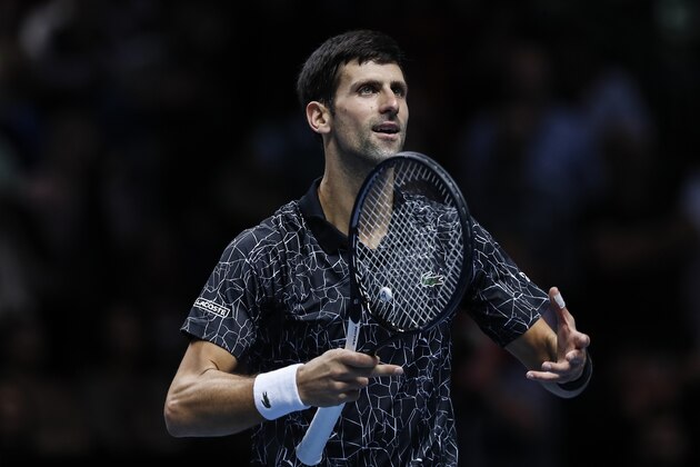 LONDON, ENGLAND - NOVEMBER 14:  Novak Djokovic of Serbia celebrates match point during his singles round robin match against Alexander Zverev of Germany during Day Four of the Nitto ATP Finals at The O2 Arena on November 14, 2018 in London, England.(Photo by Fred Lee/Getty Images)