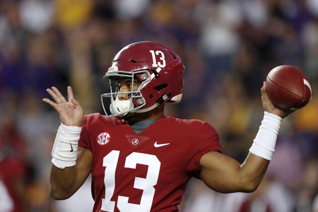 Alabama quarterback Tua Tagovailoa (13) warms up before an NCAA college football game against LSU in Baton Rouge, La., Saturday, Nov. 3, 2018. (AP Photo/Gerald Herbert)