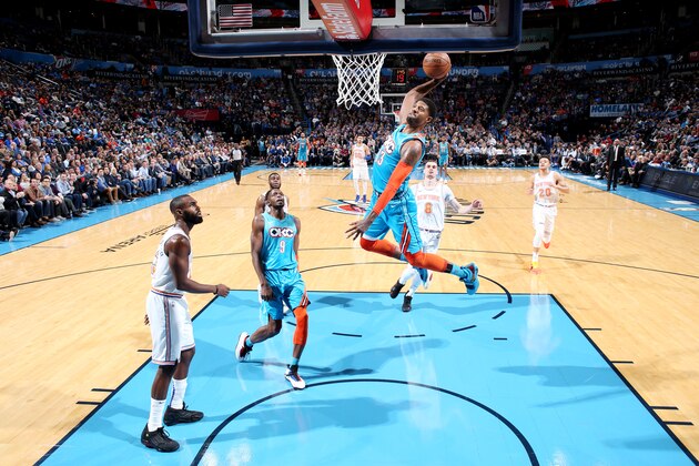 OKLAHOMA CITY, OK- NOVEMBER 14:  Paul George #13 of the Oklahoma City Thunder dunks the ball against the New York Knicks on November 14, 2018 at Chesapeake Energy Arena in Oklahoma City, Oklahoma. NOTE TO USER: User expressly acknowledges and agrees that, by downloading and or using this photograph, User is consenting to the terms and conditions of the Getty Images License Agreement. Mandatory Copyright Notice: Copyright 2018 NBAE (Photo by Joe Murphy/NBAE via Getty Images)