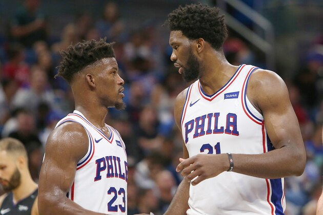 ORLANDO, FL - NOVEMBER  14: Jimmy Butler #23 of the Philadelphia 76ers speaks with Joel Embiid #21 of the Philadelphia 76ers during a NBA game against the Orlando Magic at Amway Center on November 14, 2018 in Orlando, Florida. NOTE TO USER: User expressly acknowledges and agrees that, by downloading and or using this photograph, User is consenting to the terms and conditions of the Getty Images License Agreement. (Photo by Alex Menendez/Getty Images)