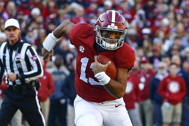 Alabama quarterback Tua Tagovailoa (13) scrambles for yardage during the first half of an NCAA college football game against Mississippi State, Saturday, Nov. 10, 2018, in Tuscaloosa, Ala. (AP Photo/Butch Dill)