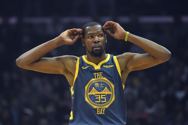 Golden State Warriors forward Kevin Durant gestures during a break in the game during the first half of an NBA basketball game against the Los Angeles Clippers Monday, Nov. 12, 2018, in Los Angeles. (AP Photo/Mark J. Terrill)