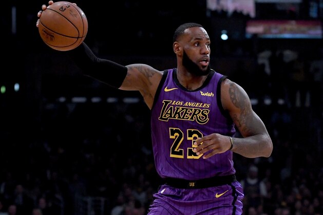 LOS ANGELES, CA - NOVEMBER 14:  LeBron James #23 of the Los Angeles Lakers controls the ball during the first half against the Portland Trail Blazers at Staples Center on November 14, 2018 in Los Angeles, California.  NOTE TO USER: User expressly acknowledges and agrees that, by downloading and or using this photograph, User is consenting to the terms and conditions of the Getty Images License Agreement.  (Photo by Harry How/Getty Images)