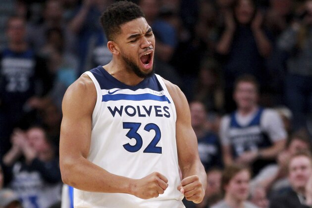 Minnesota Timberwolves forward Karl-Anthony Towns celebrates a basket against the Oklahoma City Thunder during the fourth quarter of an NBA basketball game Wednesday, Jan. 10, 2018, in Minneapolis. The Timberwolves defeated the Thunder 104-88. (AP Photo/Andy Clayton-King)