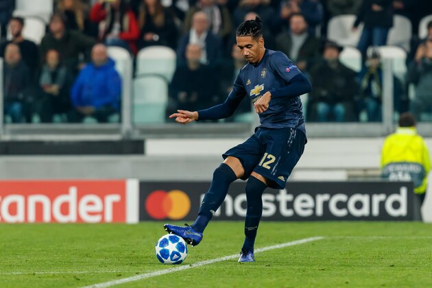 TURIN, ITALY - NOVEMBER 07: Chris Smalling of Manchester United controls the ball during the Group H match of the UEFA Champions League between Juventus and Manchester United at  on November 7, 2018 in Turin, Italy. (Photo by TF-Images/Getty Images)