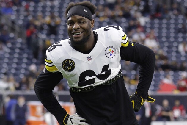 FILE - In this Dec. 25, 2017, file photo, Pittsburgh Steelers running back Le'Veon Bell (26) warms up before an NFL football game against the Houston Texans, in Houston. The Le'Veon Bell watch is almost over for the Steelers. The star running back has until 4 p.m. on Tuesday, Nov. 13, 2018, afternoon to sign his one-year franchise tender and be eligible to play this season. (AP Photo/Michael Wyke, FIle)