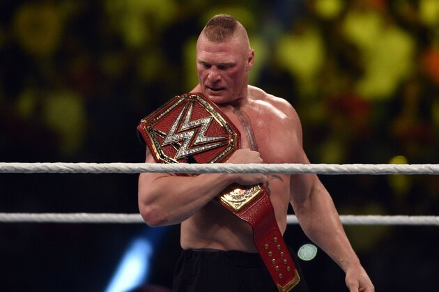 Brock Lesnar celebrates after winning the WWE Universal Championship match as part of as part of the World Wrestling Entertainment (WWE) Crown Jewel pay-per-view at the King Saud University Stadium in Riyadh on November 2, 2018. (Photo by Fayez Nureldine / AFP)        (Photo credit should read FAYEZ NURELDINE/AFP/Getty Images)