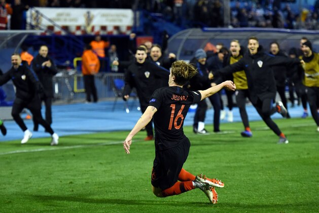Croatia's Tin Jedvaj celebrates after scoring a second goal during the UEFA Nations League football match between Croatia and Spain at the Maksimir Stadium in Zagreb on November 15, 2108. (Photo by - / AFP)        (Photo credit should read -/AFP/Getty Images)