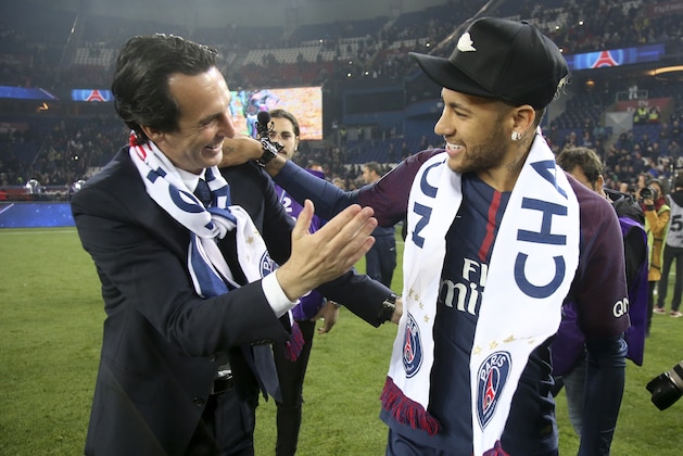 PARIS, FRANCE - MAY 12: Coach of PSG Unai Emery, Neymar Jr celebrate during the French Ligue 1 Championship Trophy Ceremony following the Ligue 1 match between Paris Saint-Germain (PSG) and Stade Rennais (Rennes) at Parc des Princes stadium on May 12, 2018 in Paris, France. (Photo by Jean Catuffe/Getty Images)