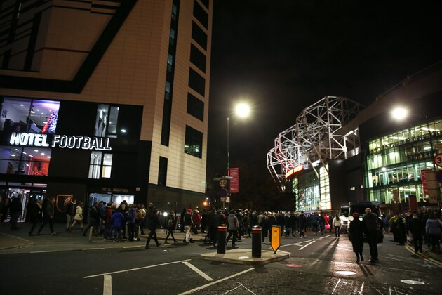 MANCHESTER, ENGLAND - NOVEMBER 24: Manchester United fans make their way past Hotel Football on their way to the stadium before the UEFA Europa League match between Manchester United FC and Feyenoord at Old Trafford on November 24, 2016 in Manchester, England. (Photo by Barrington Coombs/Getty Images) MANCHESTER, ENGLAND - NOVEMBER 24: Manchester United fans make their way past Hotel Football on their way to the stadium before the UEFA Europa League match between Manchester United FC and Feyenoord at Old Trafford on November 24, 2016 in Manchester, England. (Photo by Barrington Coombs/Getty Images)