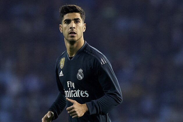 VIGO, SPAIN - NOVEMBER 11:  Marco Asensio of Real Madrid in action during the La Liga match between RC Celta de Vigo and Real Madrid CF at Abanca Balaidos Stadium on November 11, 2018 in Vigo, Spain  (Photo by Quality Sport Images/Getty Images)