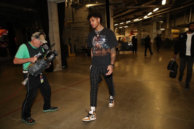 MIAMI, FL - NOVEMBER 10: Kelly Oubre Jr. #12 of the Washington Wizards arrives to the arena prior to the game against the Miami Heat on November 10, 2018 at American Airlines Arena in Miami, Florida. NOTE TO USER: User expressly acknowledges and agrees that, by downloading and or using this photograph, user is consenting to the terms and conditions of Getty Images License Agreement. Mandatory Copyright Notice: Copyright 2018 NBAE (Photo by Issac Baldizon/NBAE via Getty Images)