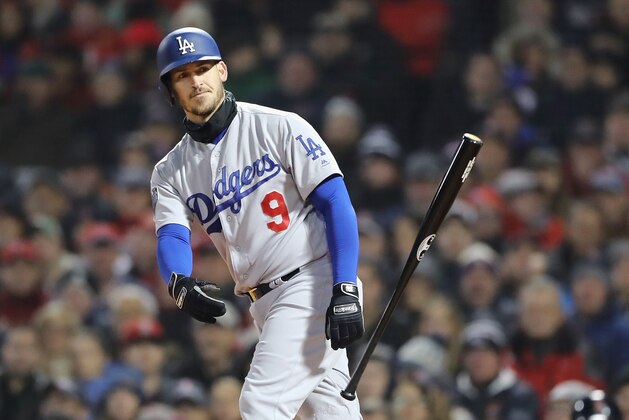 BOSTON, MA - OCTOBER 23:  Yasmani Grandal #9 of the Los Angeles Dodgers draws a walk during the seventh inning against the Boston Red Sox in Game One of the 2018 World Series at Fenway Park on October 23, 2018 in Boston, Massachusetts.  (Photo by Elsa/Getty Images)