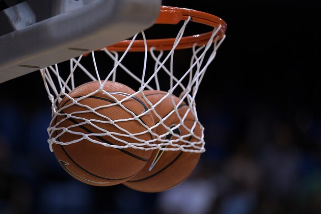 CHAPEL HILL, NC - DECEMBER 20: Two basketballs are stuck in a net prior to the game between the Wofford Terriers and the North Carolina Tar Heels at Dean Smith Center on December 20, 2017 in Chapel Hill, North Carolina. Wofford won 79-75. (Photo by Lance King/Getty Images)