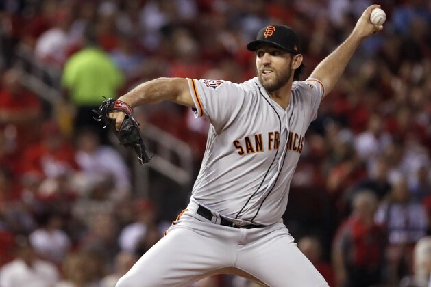 San Francisco Giants starting pitcher Madison Bumgarner throws during the first inning of the team's baseball game against the St. Louis Cardinals on Friday, Sept. 21, 2018, in St. Louis. (AP Photo/Jeff Roberson)