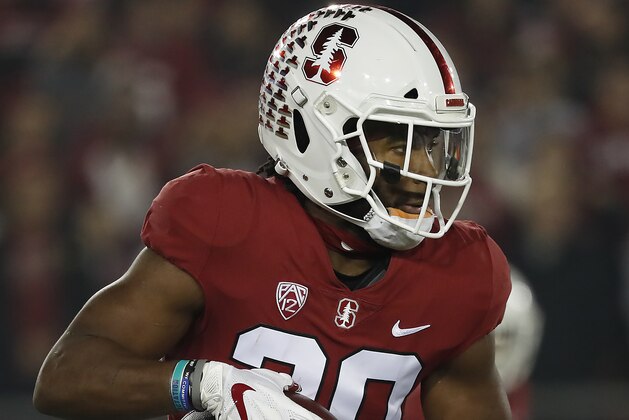 Stanford running back Bryce Love (20) rushes against Oregon State in the first half during an NCAA college football game on Saturday, Nov. 10, 2018, in Stanford, Calif. Stanford won 48-17. (AP Photo/Tony Avelar)
