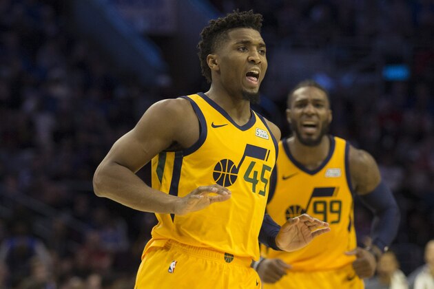 PHILADELPHIA, PA - NOVEMBER 16: Donovan Mitchell #45 and Jae Crowder #99 of the Utah Jazz react in the fourth quarter against the Philadelphia 76ers at the Wells Fargo Center on November 16, 2018 in Philadelphia, Pennsylvania. The 76ers defeated the Jazz 113-107. NOTE TO USER: User expressly acknowledges and agrees that, by downloading and or using this photograph, User is consenting to the terms and conditions of the Getty Images License Agreement. (Photo by Mitchell Leff/Getty Images)