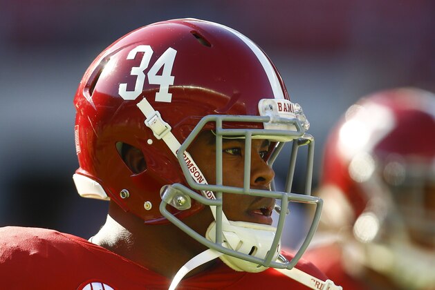 Alabama running back Damien Harris (34) warms up before the start of an NCAA college football game, Saturday, Nov. 10, 2018, in Tuscaloosa, Ala. (AP Photo/Butch Dill)
