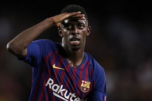 Barcelona forward Ousmane Dembele celebrates after scoring his side's second goal during the group B Champions League soccer match between FC Barcelona and PSV Eindhoven at the Camp Nou stadium in Barcelona, Spain, Tuesday, Sept. 18, 2018. (AP Photo/Manu Fernandez)