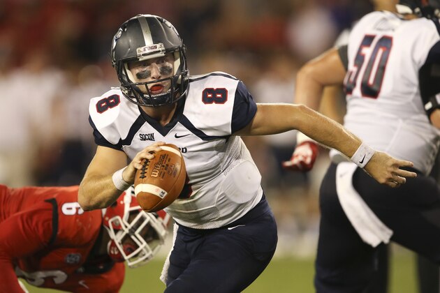 Samford quarterback Devlin Hodges (8) scrambles away from Georgia linebacker Natrez Patrick (6) in the first half of an NCAA college football game Saturday, Sept. 16, 2017, in Athens, Ga. (AP Photo/John Bazemore)