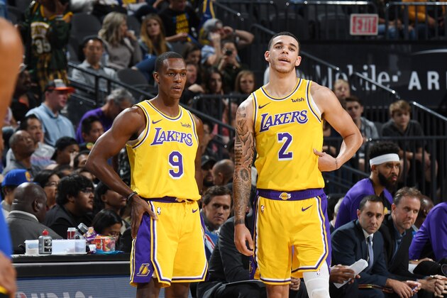 LAS VEGAS, NV- OCTOBER 10: Rajon Rondo #9  and Lonzo Ball #2 of the Los Angeles Lakers look on against the Golden State Warriors during a pre-season game on October 10, 2018 at T-Mobile Arena in Las Vegas, Nevada. NOTE TO USER: User expressly acknowledges and agrees that, by downloading and/or using this Photograph, user is consenting to the terms and conditions of the Getty Images License Agreement. Mandatory Copyright Notice: Copyright 2018 NBAE (Photo by Andrew D. Bernstein/NBAE via Getty Images)