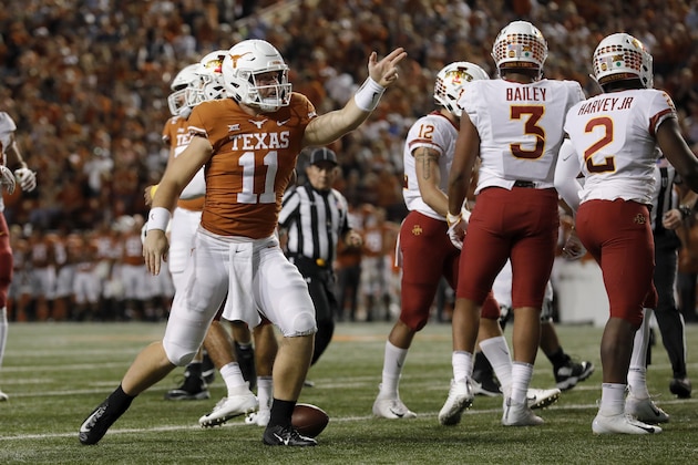 AUSTIN, TX - NOVEMBER 17:  Sam Ehlinger #11 of the Texas Longhorns signals after a first down in the first quarter against the Iowa State Cyclones at Darrell K Royal-Texas Memorial Stadium on November 17, 2018 in Austin, Texas.  (Photo by Tim Warner/Getty Images)