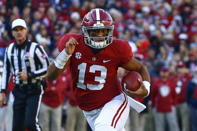 Alabama quarterback Tua Tagovailoa (13) scrambles for yardage during the first half of an NCAA college football game against Mississippi State, Saturday, Nov. 10, 2018, in Tuscaloosa, Ala. (AP Photo/Butch Dill)