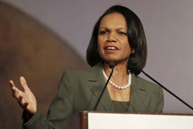 FILE - In this March 15, 2014 file photo, former Secretary of State Condoleezza Rice gestures while speaking at the California Republican Party 2014 Spring Convention in Burlingame, Calif.  University of Minnesota faculty and student activists are pressuring the school to rescind its invitation to Rice to speak at the Twin Cities campus April 17 as part of the Humphrey School of Public Affairs’ lecture series. Math professor William Messing has introduced a resolution to be considered by the University Senate next week which asks that the Rice speech be canceled because of her role in the wartime policies of the Bush administration.(AP Photo/Ben Margot, File)