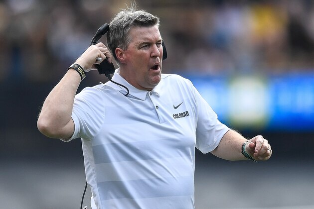 BOULDER, CO - OCTOBER 27:  Head coach Mike MacIntyre of the Colorado Buffaloes works as he removes his headset during a game against the Oregon State Beavers at Folsom Field on October 27, 2018 in Boulder, Colorado.  (Photo by Dustin Bradford/Getty Images)