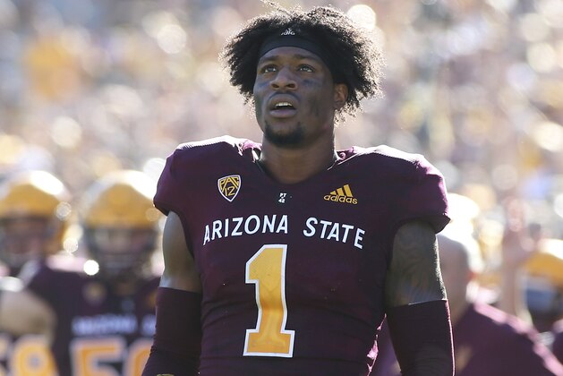 Arizona State wide receiver N'Keal Harry (1) watches a video replay on the stadium scoreboard during the second half of an NCAA college football game against UCLA, Saturday, Nov. 10, 2018, in Tempe, Ariz. (AP Photo/Ralph Freso)
