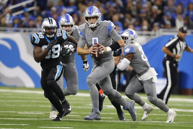 Detroit Lions quarterback Matthew Stafford (9) scrambles during the second half of an NFL football game against the Carolina Panthers, Sunday, Nov. 18, 2018, in Detroit. (AP Photo/Paul Sancya)