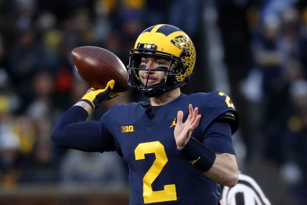 Michigan quarterback Shea Patterson (2) throws against Indiana in the first half of an NCAA college football game against Indiana in Ann Arbor, Mich., Saturday, Nov. 17, 2018. (AP Photo/Paul Sancya)