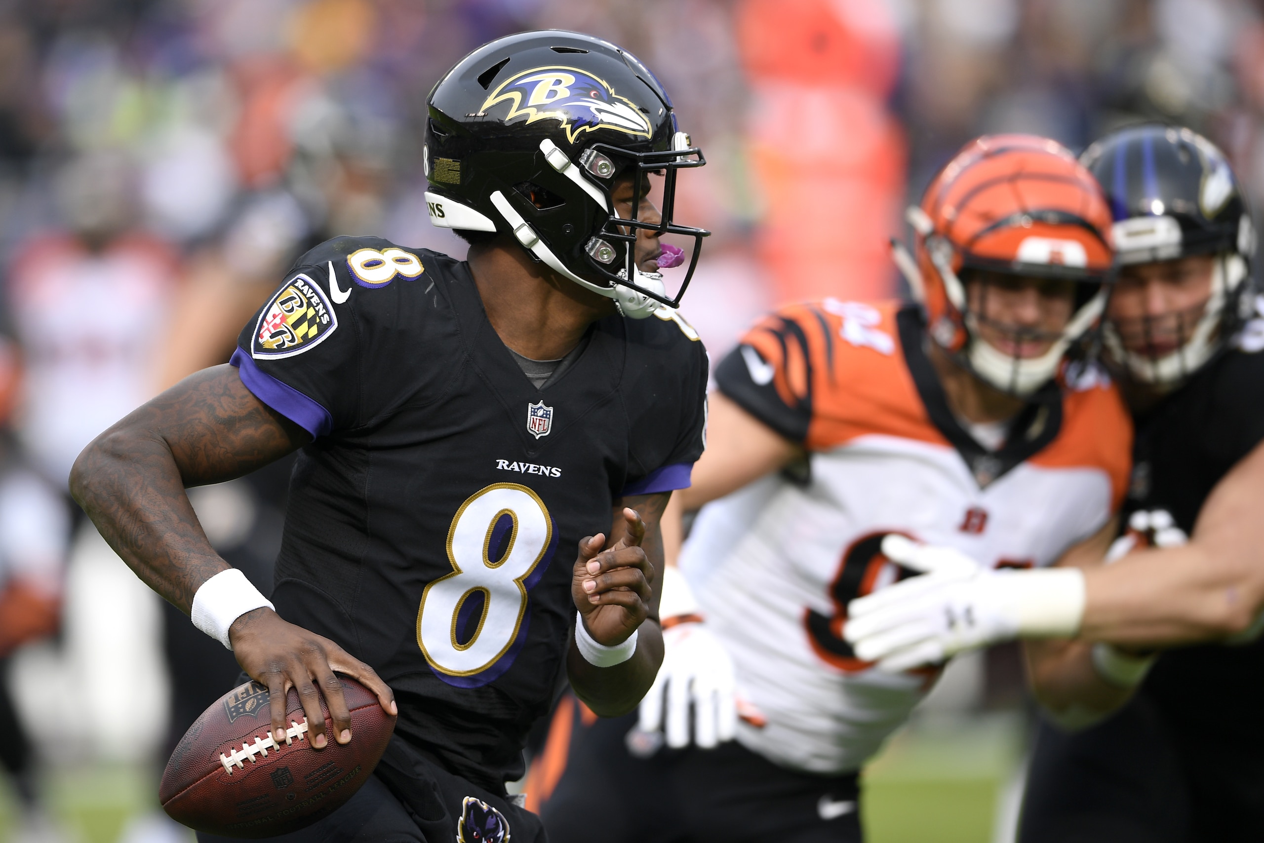 Baltimore Ravens quarterback Lamar Jackson (8) looks for a receiver in the first half of an NFL football game against the Cincinnati Bengals, Sunday, Nov. 18, 2018, in Baltimore. (AP Photo/Nick Wass) Baltimore Ravens quarterback Lamar Jackson (8) looks for a receiver in the first half of an NFL football game against the Cincinnati Bengals, Sunday, Nov. 18, 2018, in Baltimore. (AP Photo/Nick Wass)