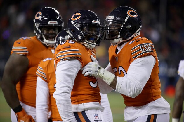 CHICAGO, IL - NOVEMBER 18:  Danny Trevathan #59 and Khalil Mack #52 of the Chicago Bears celebrate after a tackle on the Minnesota Vikings in the second quarter at Soldier Field on November 18, 2018 in Chicago, Illinois.  (Photo by Jonathan Daniel/Getty Images)