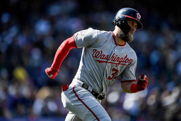 DENVER, CO - SEPTEMBER 30:  Bryce Harper #34 of the Washington Nationals runs out a fourth inning double against the Colorado Rockies at Coors Field on September 30, 2018 in Denver, Colorado.  (Photo by Dustin Bradford/Getty Images)