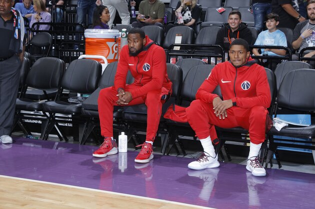 SACRAMENTO, CA - OCTOBER 26: John Wall #2 and Bradley Beal #3 of the Washington Wizards look on during the game against the Sacramento Kings on October 26, 2018 at Golden 1 Center in Sacramento, California. NOTE TO USER: User expressly acknowledges and agrees that, by downloading and or using this photograph, User is consenting to the terms and conditions of the Getty Images Agreement. Mandatory Copyright Notice: Copyright 2018 NBAE (Photo by Rocky Widner/NBAE via Getty Images)