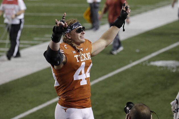 AUSTIN, TX - NOVEMBER 17:  Breckyn Hager #44 of the Texas Longhorns celebrates after the game against the Iowa State Cyclones at Darrell K Royal-Texas Memorial Stadium on November 17, 2018 in Austin, Texas.  (Photo by Tim Warner/Getty Images)