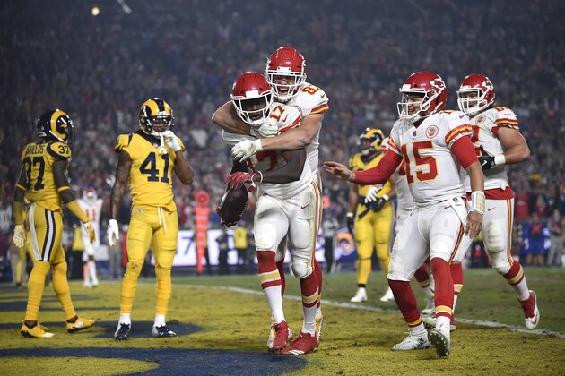 Kansas City Chiefs wide receiver Chris Conley (17) celebrates with tight end Travis Kelce (87) after Conley scored a touchdown during the first half of an NFL football game against the Los Angeles Rams, Monday, Nov. 19, 2018, in Los Angeles. (AP Photo/Kelvin Kuo)