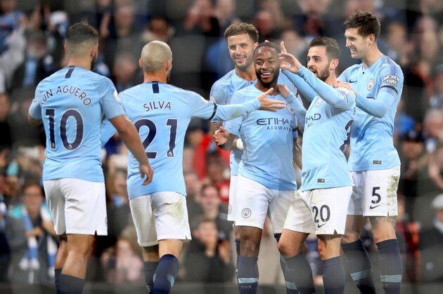 MANCHESTER, ENGLAND - NOVEMBER 04:  Raheem Sterling of Manchester City celebrates with teammates after scoring his team's fifth goal during the Premier League match between Manchester City and Southampton FC at Etihad Stadium on November 4, 2018 in Manchester, United Kingdom.  (Photo by Clive Brunskill/Getty Images)