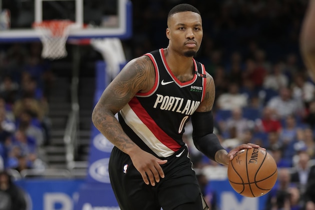 Portland Trail Blazers' Damian Lillard moves the ball against the Orlando Magic during the second half of an NBA basketball game, Thursday, Oct. 25, 2018, in Orlando, Fla. (AP Photo/John Raoux)