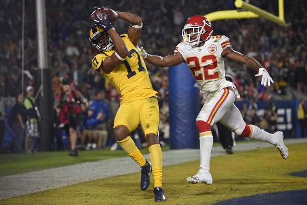 Los Angeles Rams wide receiver Robert Woods (17) catches a pass for a touchdown ahead of Kansas City Chiefs defensive back Orlando Scandrick (22) during the first half of an NFL football game Monday, Nov. 19, 2018, in Los Angeles. (AP Photo/Kelvin Kuo)