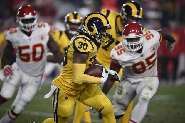 Los Angeles Rams running back Todd Gurley rushes against the Kansas City Chiefs during the first half of an NFL football game, Monday, Nov. 19, 2018, in Los Angeles. (AP Photo/Kelvin Kuo)